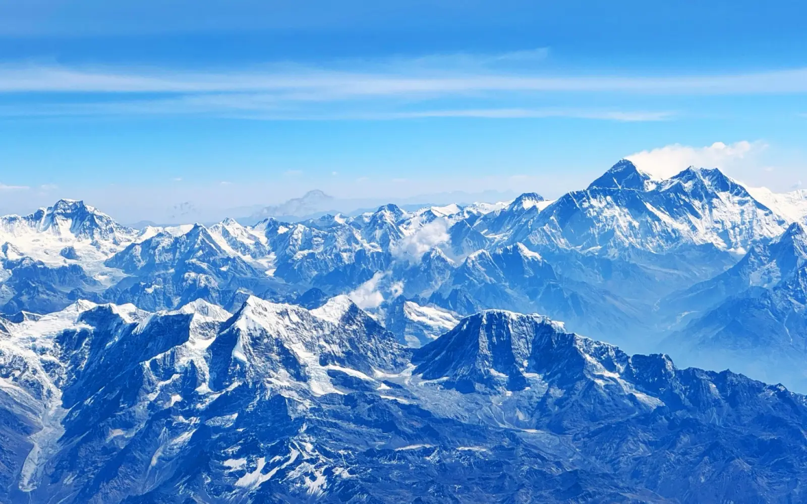 Which Mountain Range Spans Nepal, Bhutan, India, and China?