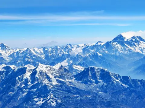 Which Mountain Range Spans Nepal, Bhutan, India, and China?