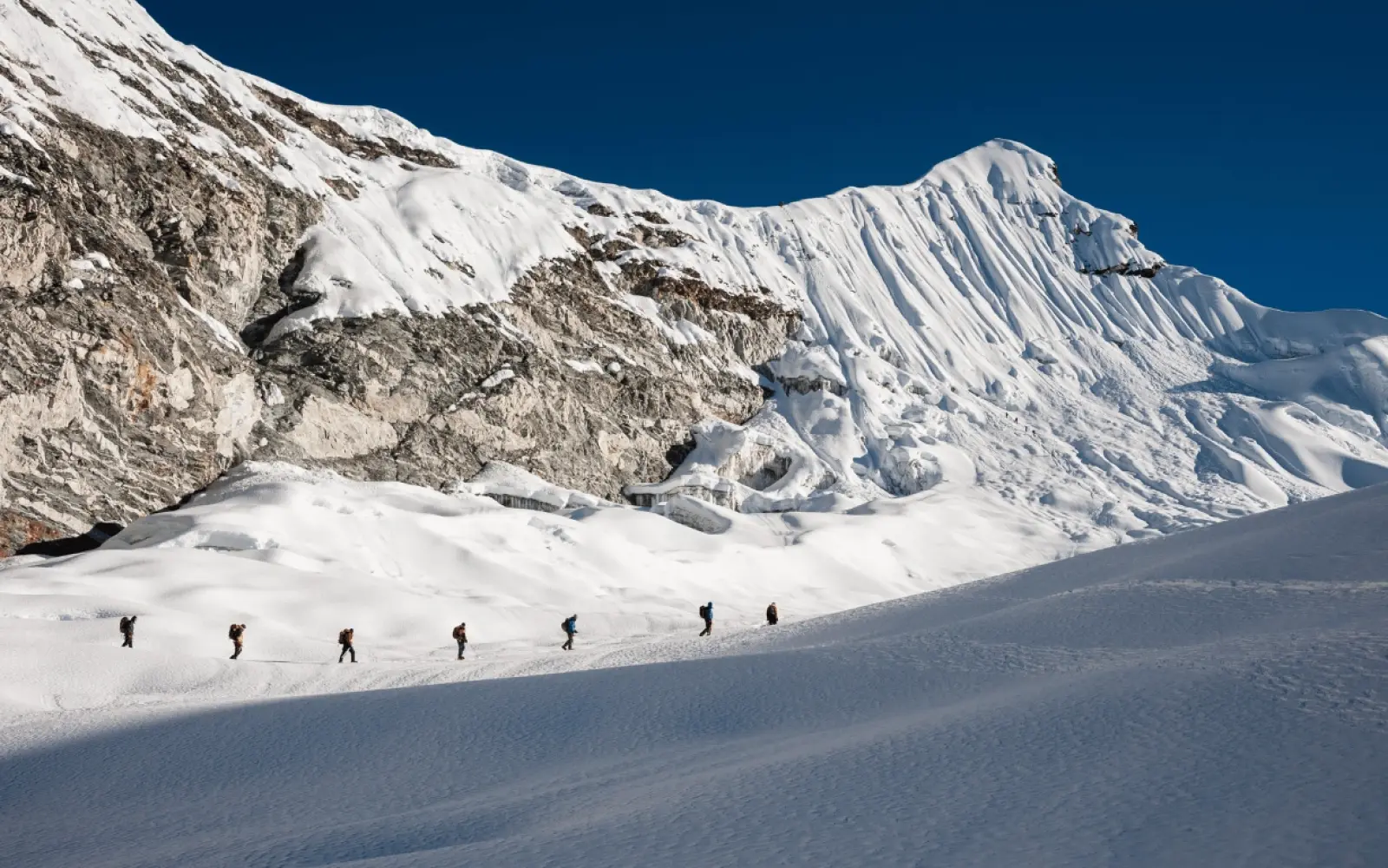 Island Peak (6,160m) summit — one of Nepal's most popular NMA trekking peaks and a genuine 6,000m+ summit for fit climbers with basic mountaineering training.