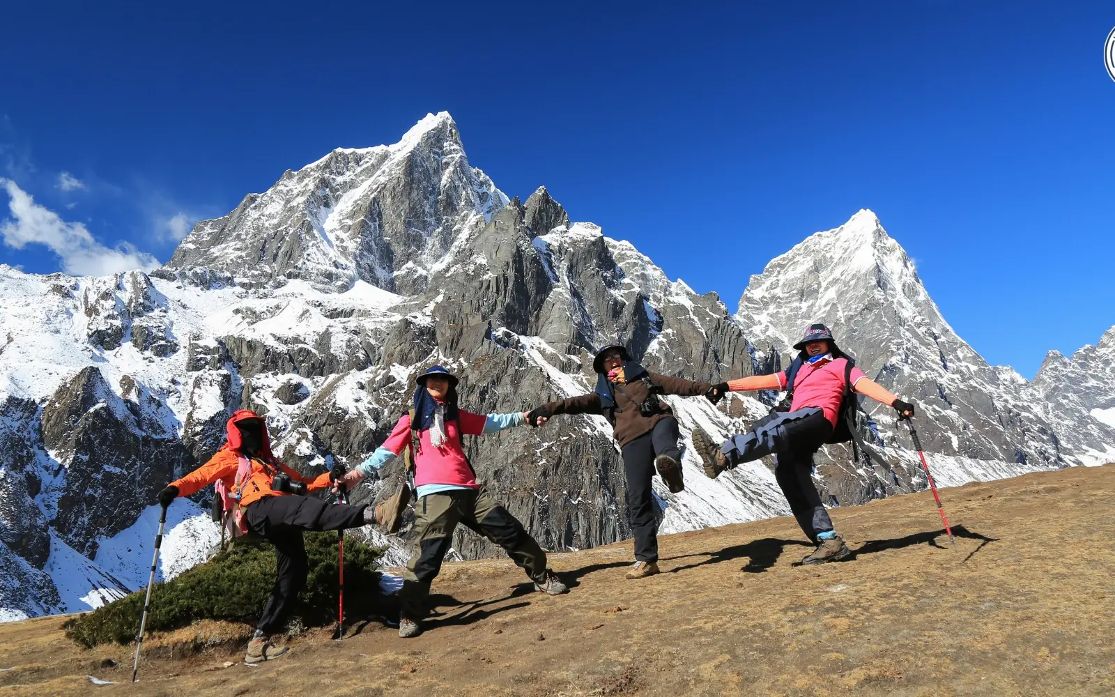 Trekkers on one of the best short treks in Nepal with sweeping Himalayan peaks and golden morning light