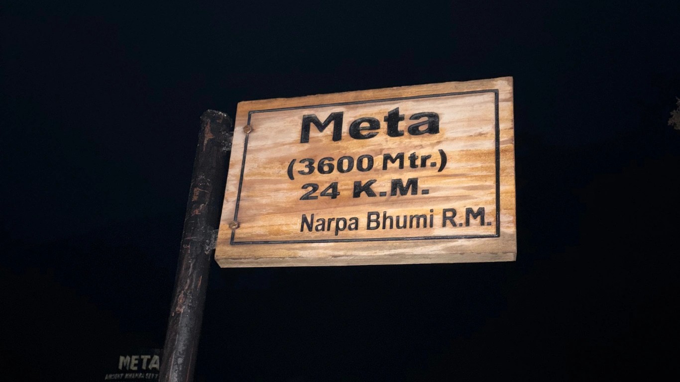 Meta village altitude board showing elevation on Nar Phu Valley Trek