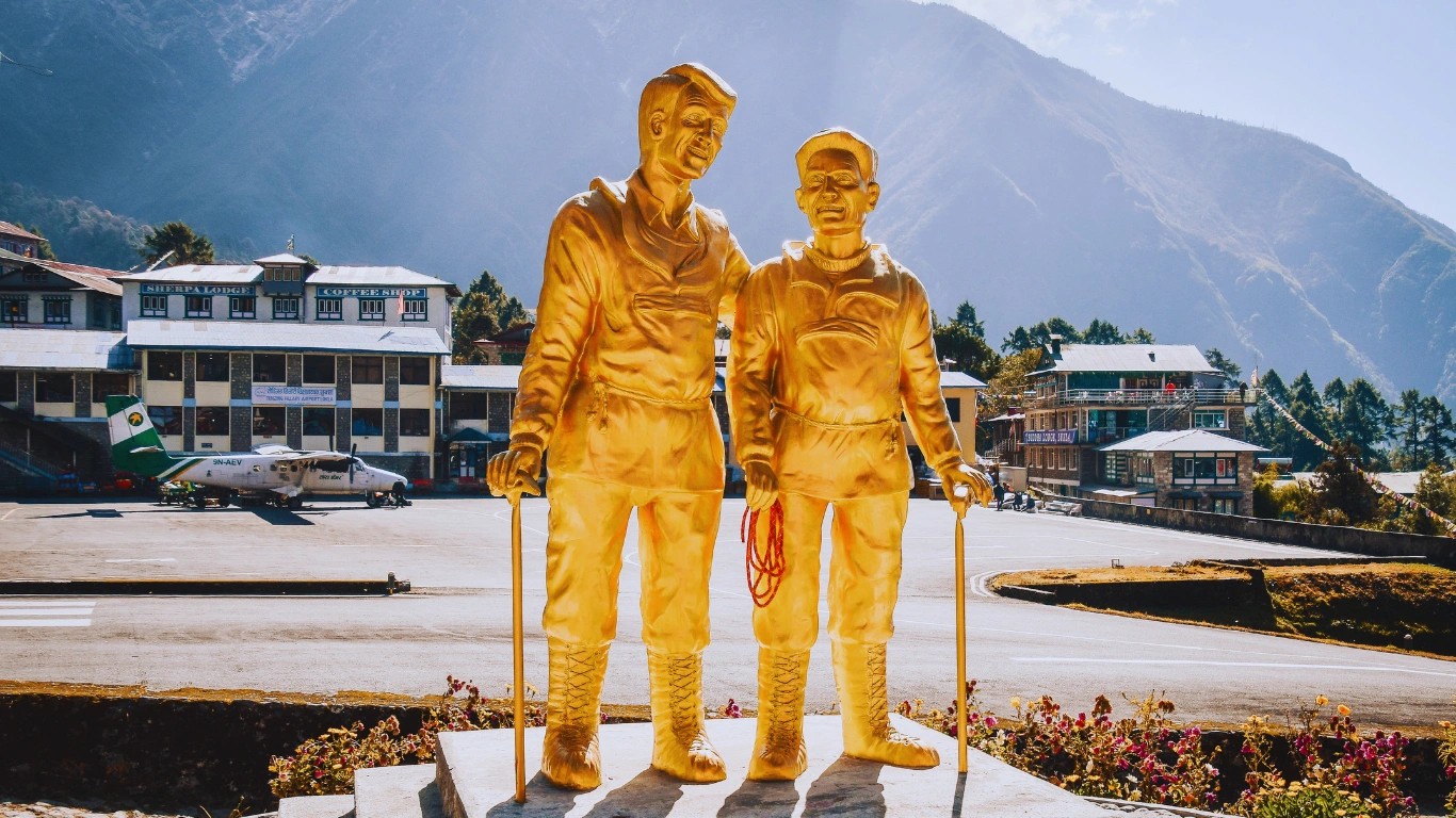 Statue of Tenzing Norgay Sherpa and Sir Edmund Hillary in Lukla, Nepal, commemorating their successful first summit of Mount Everest in 1953 and the history of Everest climbing in the Khumbu region.