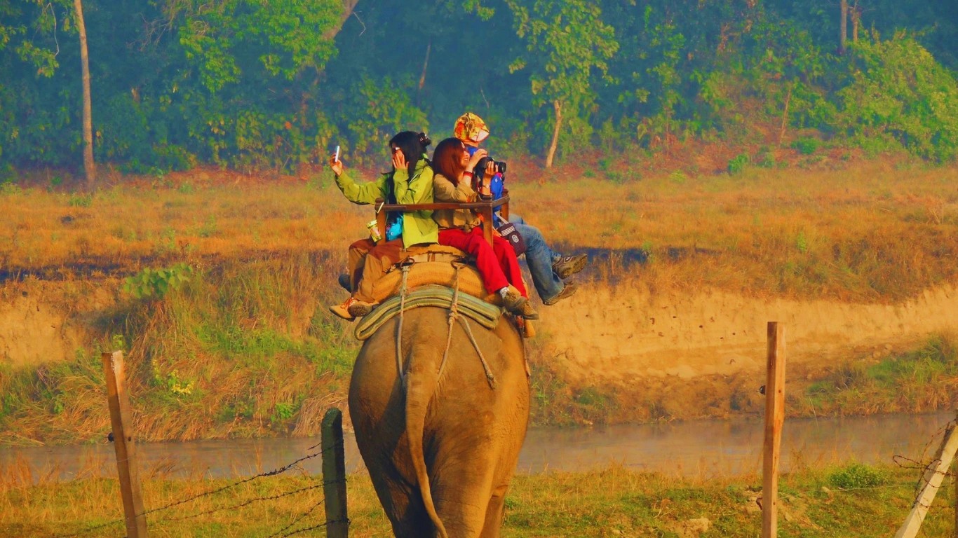 Chitwan National Park UNESCO World Heritage Site Nepal wildlife safari jungle rhinoceros and Bengal tiger habitat