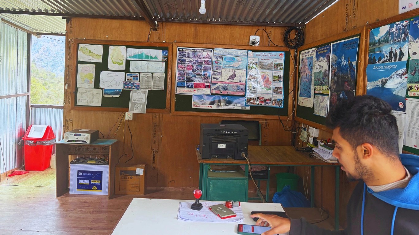 Annapurna Circuit Shikha checkpoint staff scanning ACAP permit