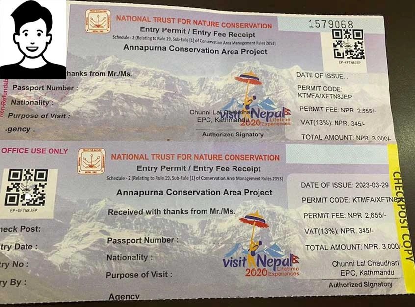 Close-up photo of trekking permits ACAP permit—necessary for abc trek nepal, placed on a table.