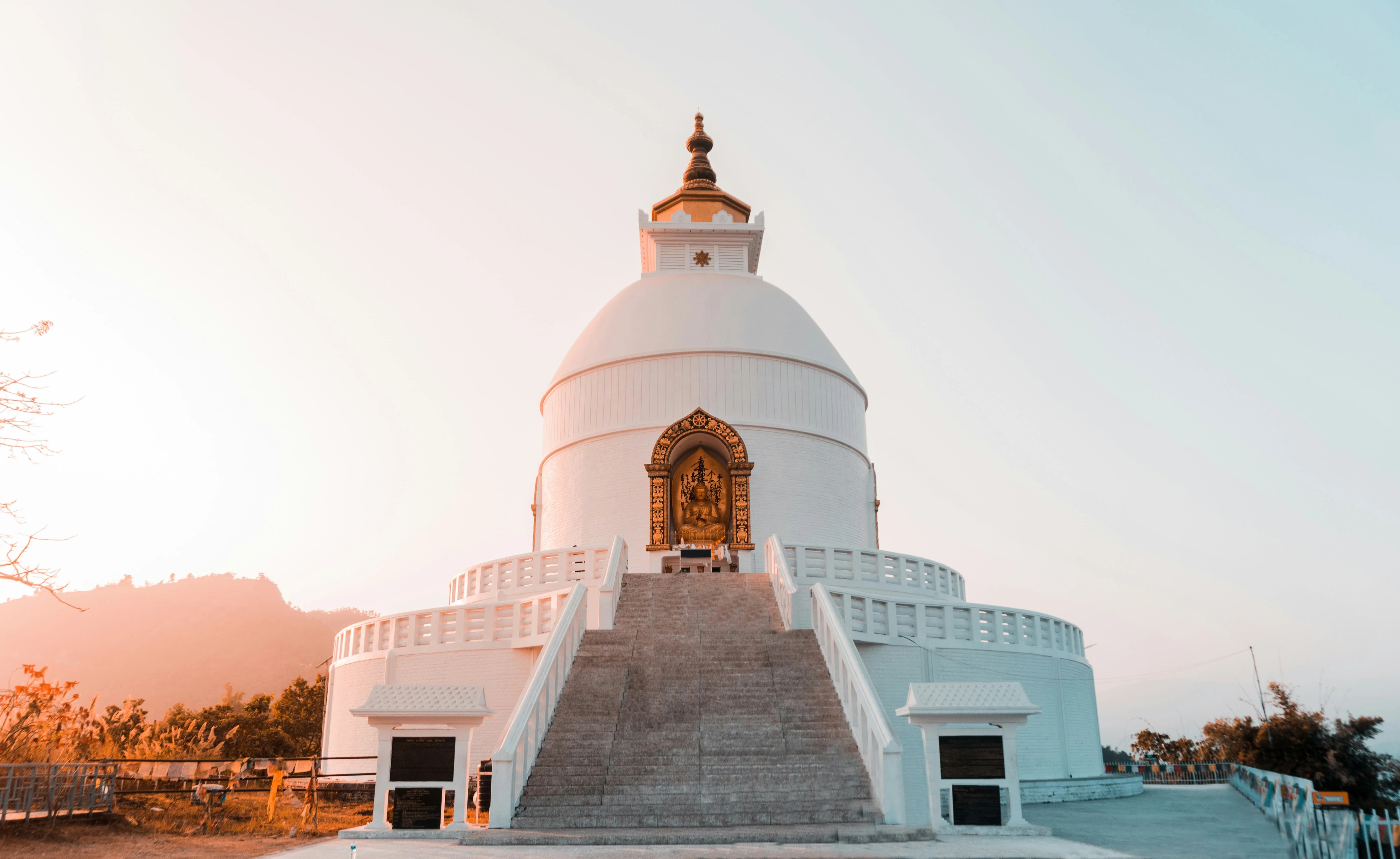Sunrise over World Peace Pagoda Pokhara during a 10 days spiritual tour in Nepal