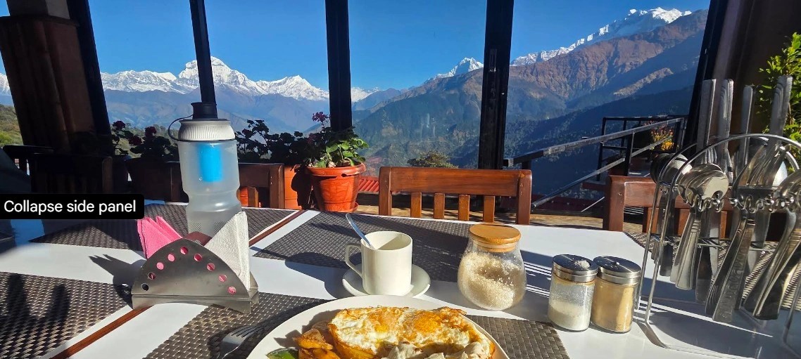 Breakfast setup with stunning Dhaulagiri mountain range in the background,ABC, Nepal