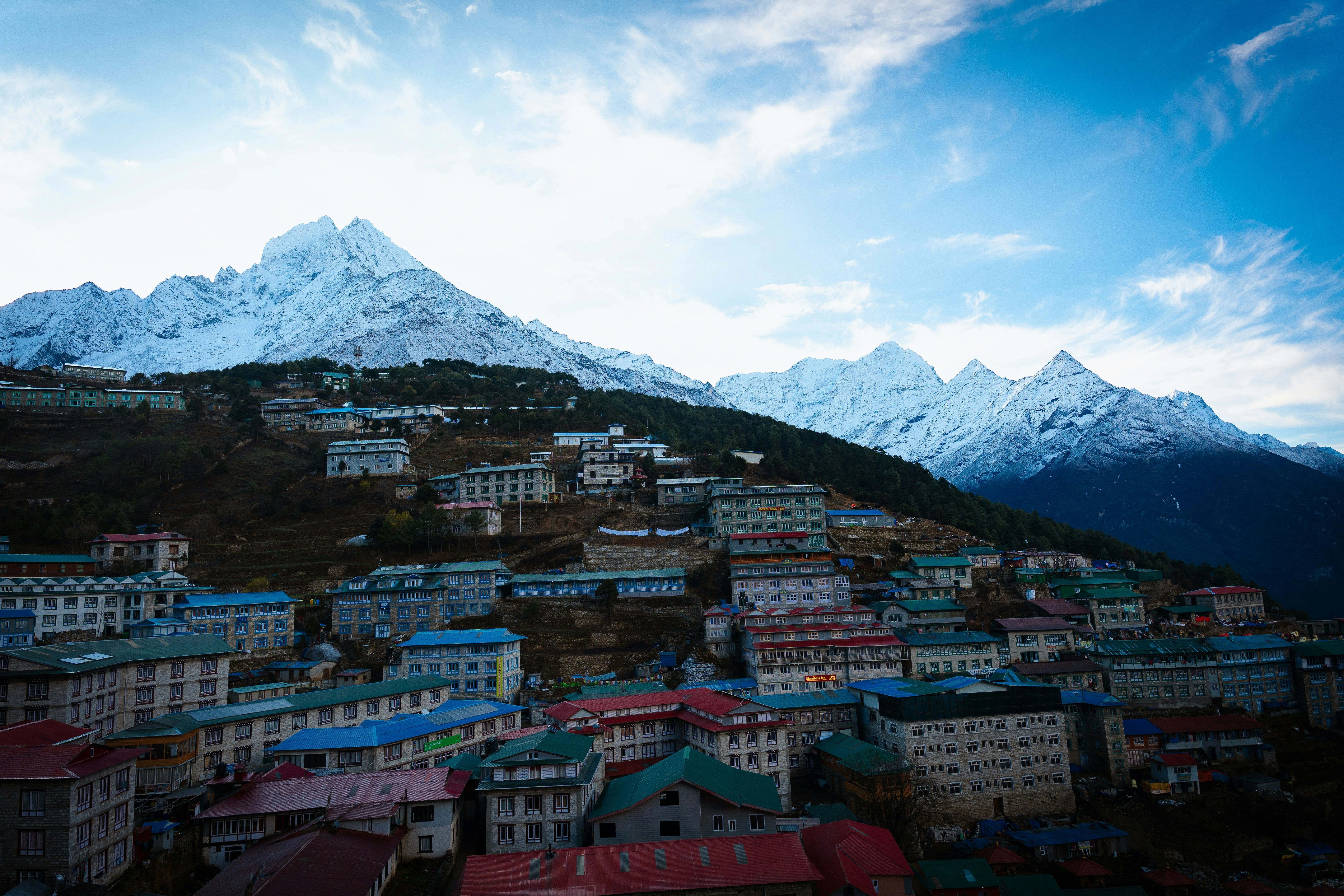 View of Namche Bazaar, the bustling Sherpa town and gateway to the Everest Base Camp Trek, surrounded by Himalayan peaks.