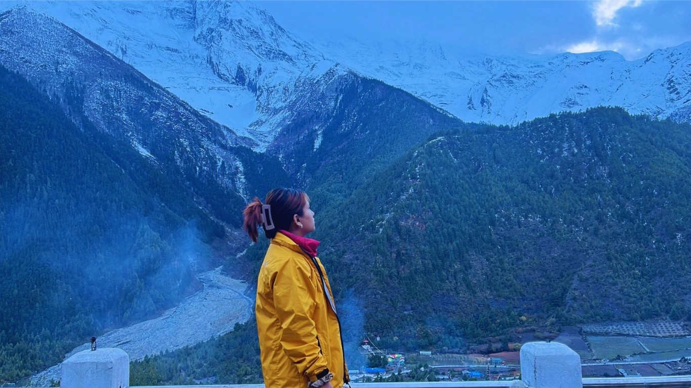 Nepal female trekking guide Bibisika Raut preparing the morning trek