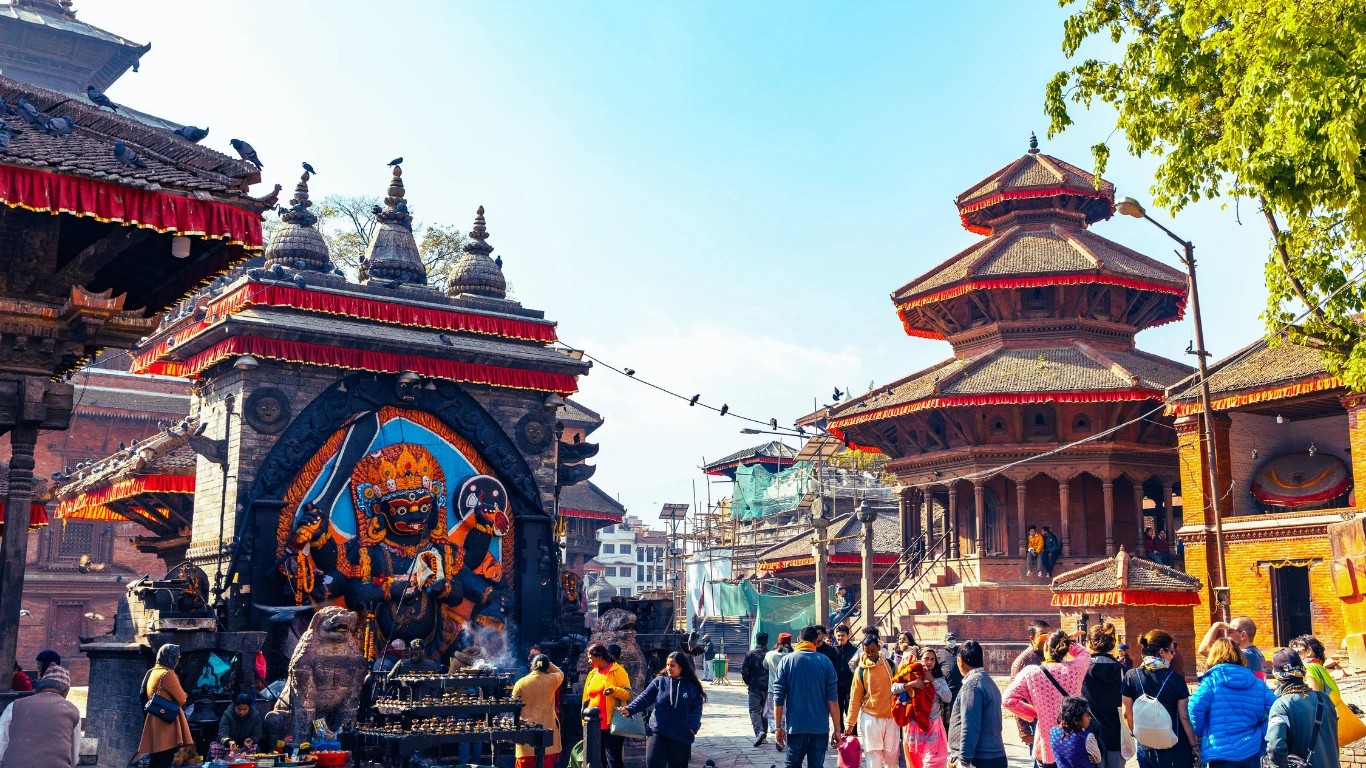Kathmandu Durbar Square showcasing Nepalese palaces, temples, and bustling streets.