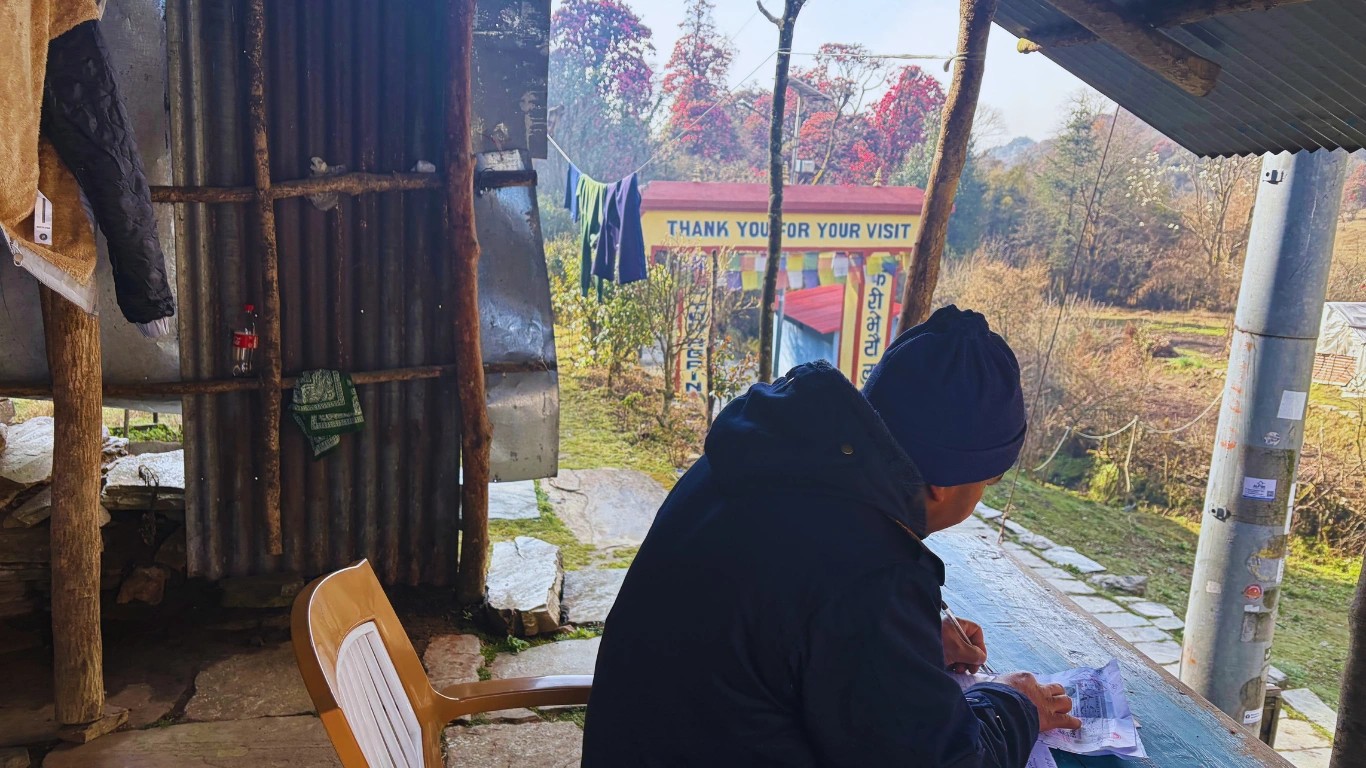 Annapurna Circuit Ghorepani checkpoint staff manually registering permits