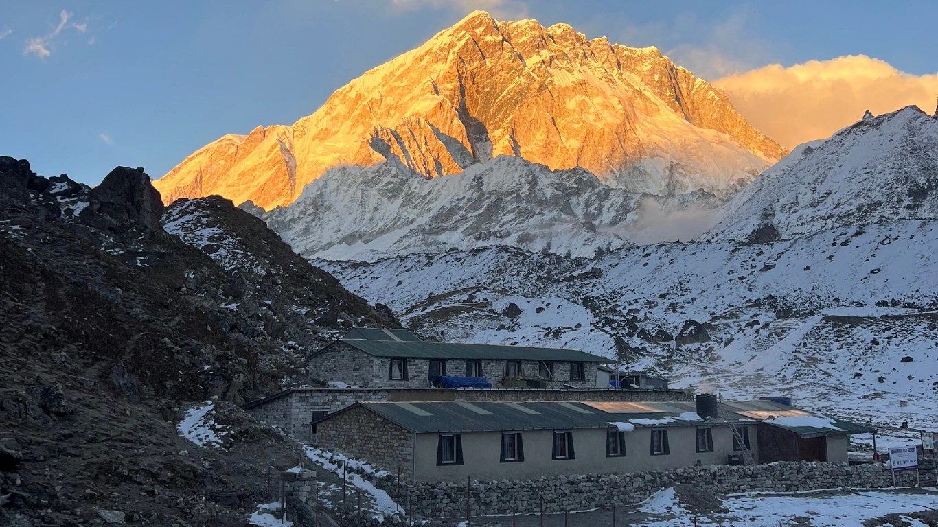 Golden spring sunset over Nuptse as seen from Lobuche during the Everest Base Camp Trek in Nepal
