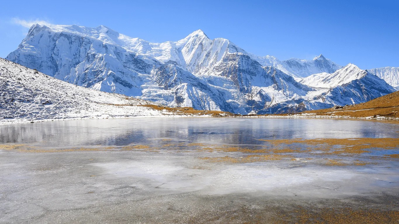 Ice Lake (Kicho Tal) height of approximately 4,600 meters and meaning of its name near Manang on the Annapurna Circuit Trek in Nepal.