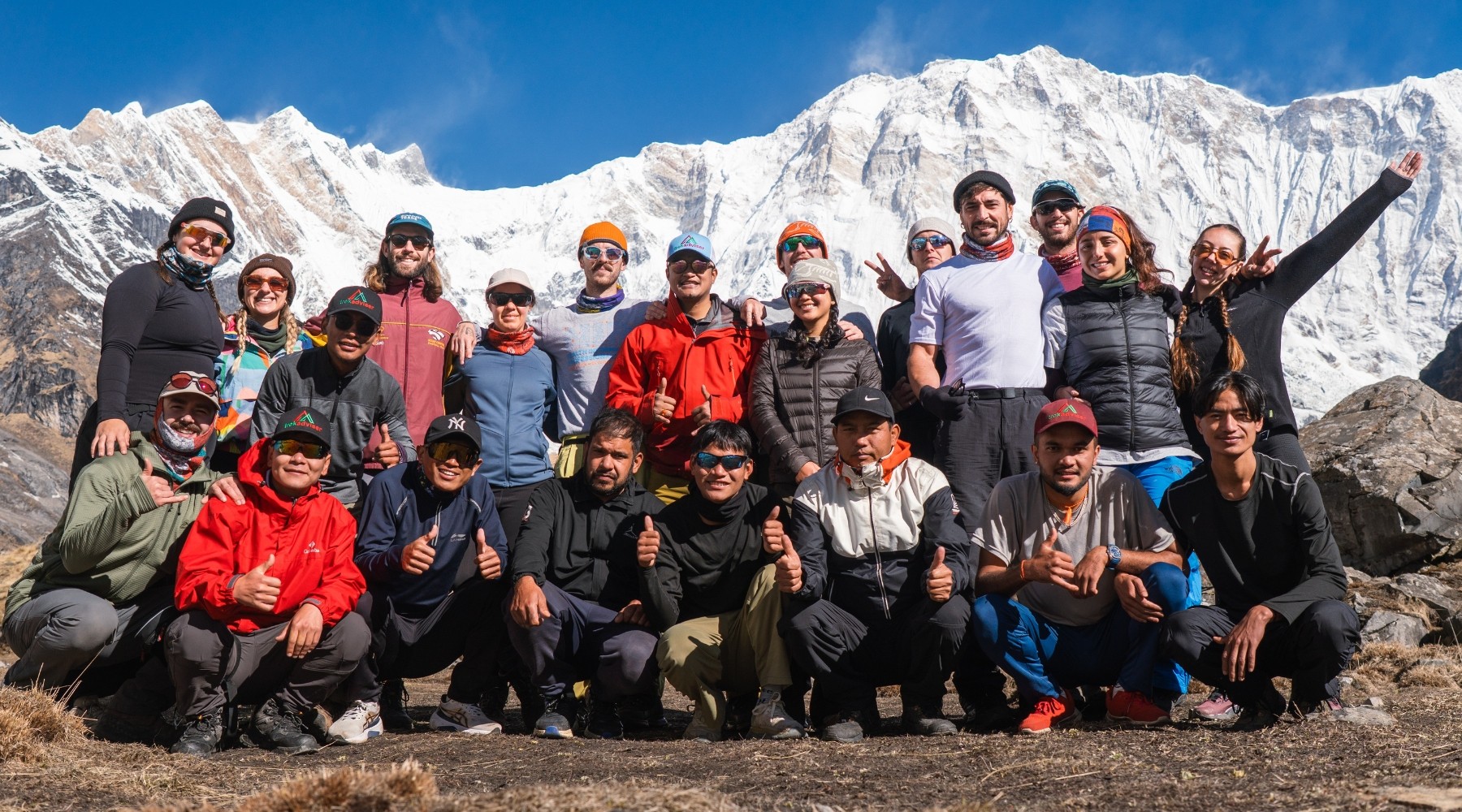 group of Trekkers at abc backdrop annapurna 1
