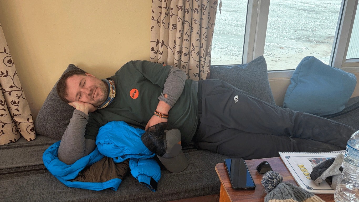 A Majestic Trails Nepal guest takes a rest at Gorak Shep during the Everest Base Camp trek.