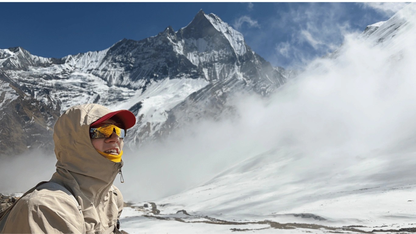 Trekkers hiking from Deurali toward Machhapuchhre Base Camp as altitude increases on the ABC trek