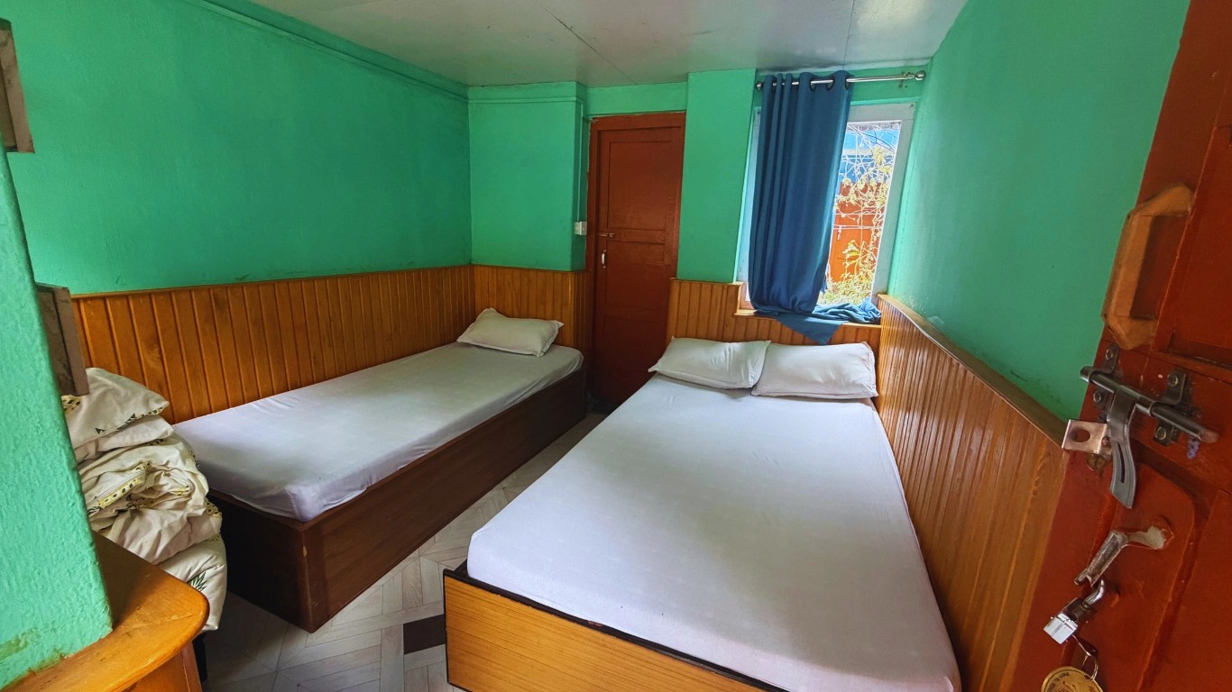 Two clean beds inside Eagle Eye Hotel in Chame on Annapurna Circuit Trek