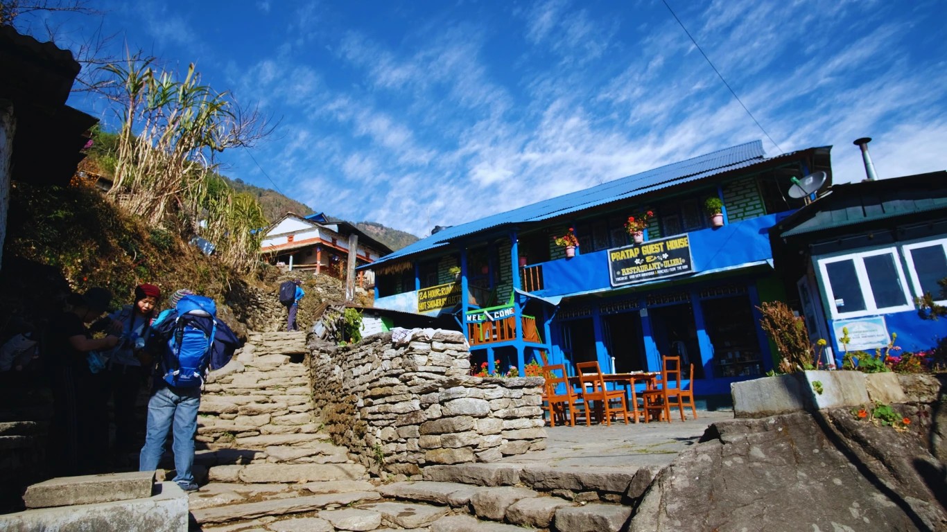 Traditional stone teahouse hotel in Ulleri along the Annapurna Base Camp Trek, showing the typical lodge exterior used by trekkers.