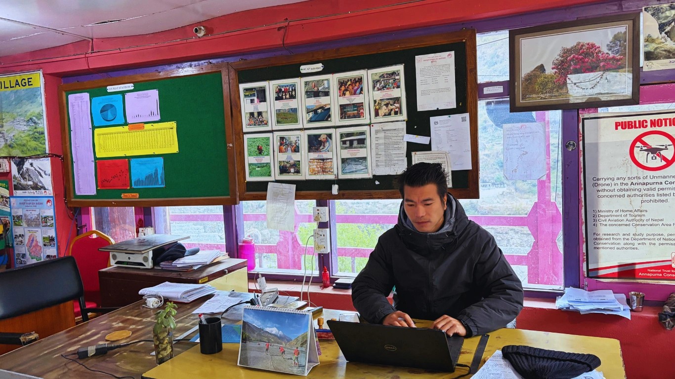 Annapurna Circuit permit checkpoint staff checking ACAP permit with trekking information