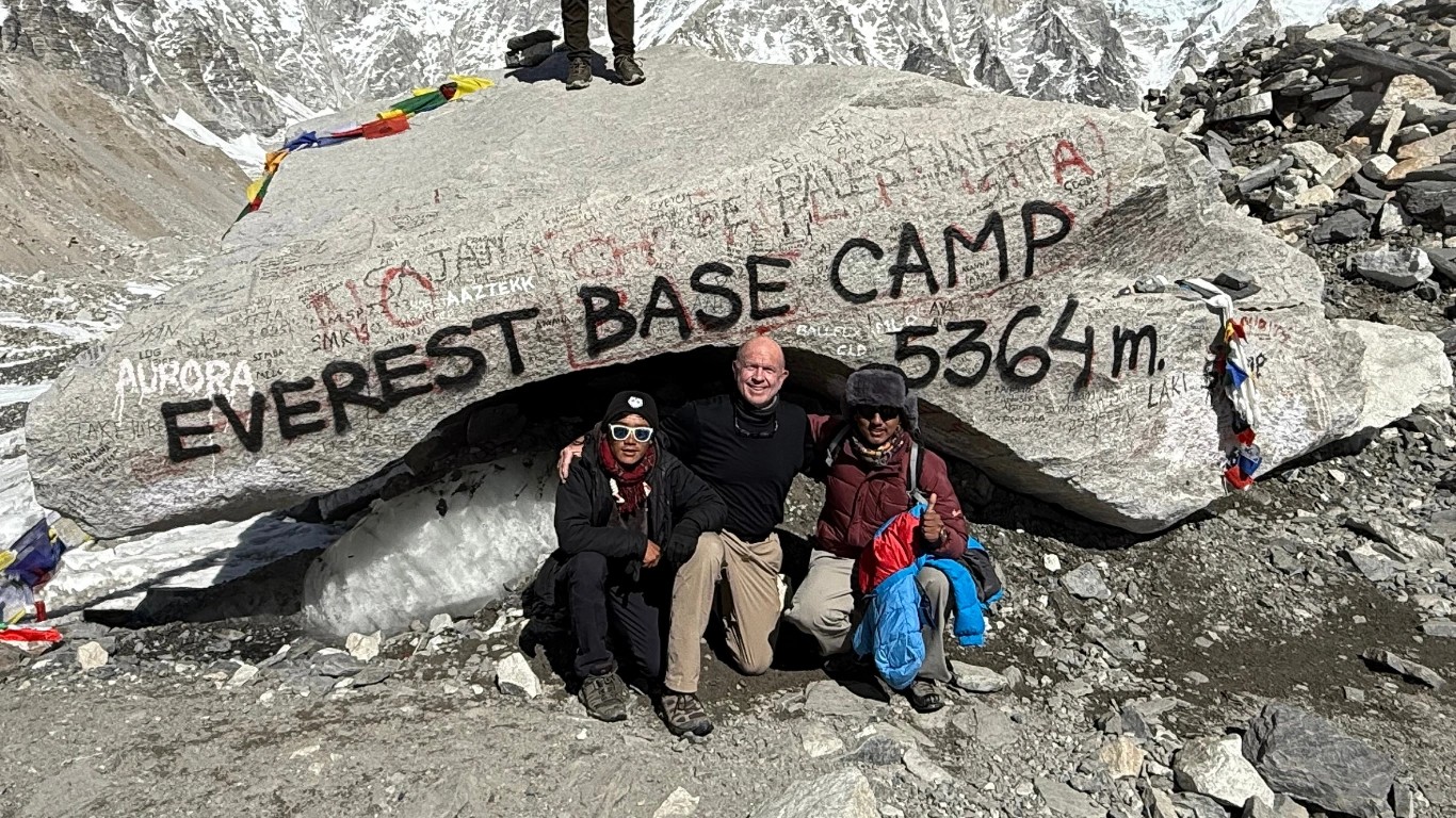 Older trekker with guide Bibek and porter during the Everest Base Camp Trek in Nepal, proving you're never too old to trek Nepal.