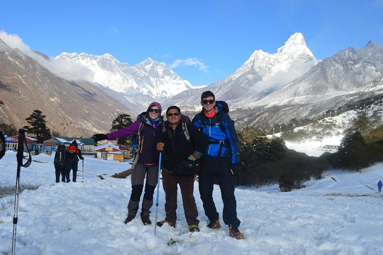 Snow-covered Everest Base Camp trail with clear mountain views in December