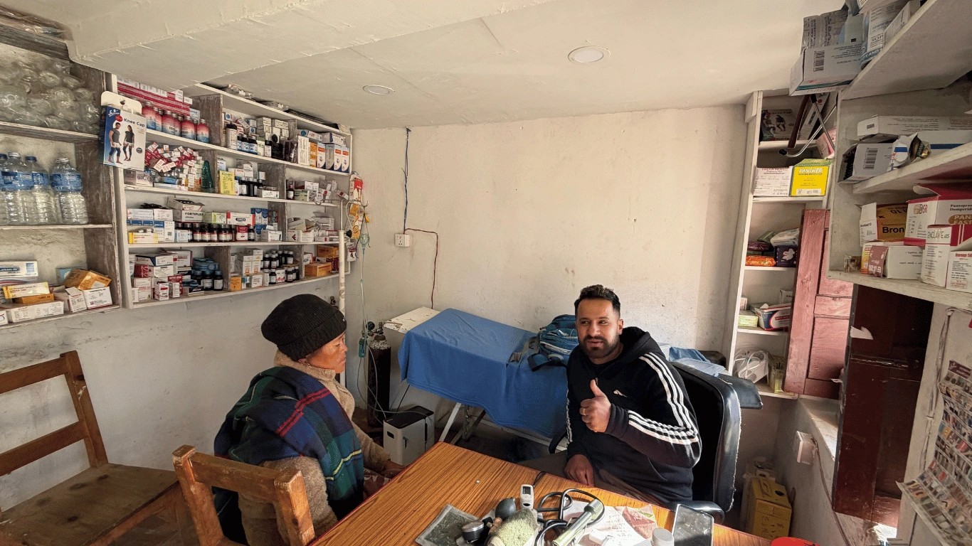The Majestic Trails Nepal team checks a guest’s condition with a doctor in Muktinath before continuing the journey.