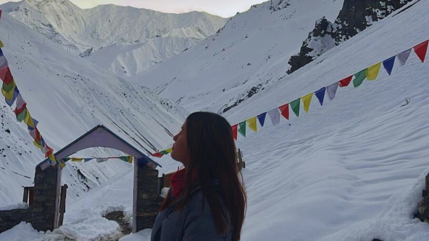 Nepal female trekking guide Bibisika Raut observing the sky at Thorong Phedi