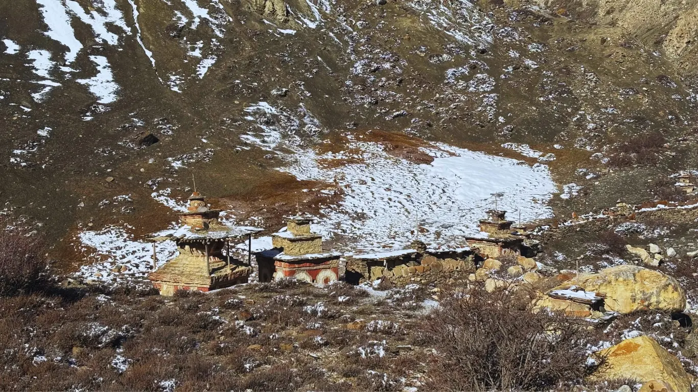 Small brown stone stupa along Nar Phu Valley Trek trail in remote Himalayan region