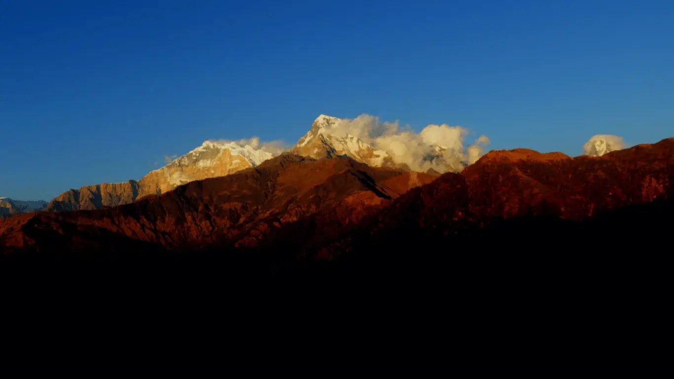 The Khopra Ridge trail passes through beautiful mountain landscapes, remote villages, and peaceful Himalayan scenery.