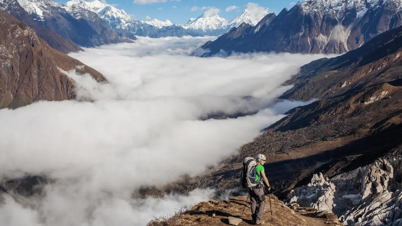 Trekkers crossing high-altitude Himalayan trails on the Tsum Valley and Manaslu Circuit Trek